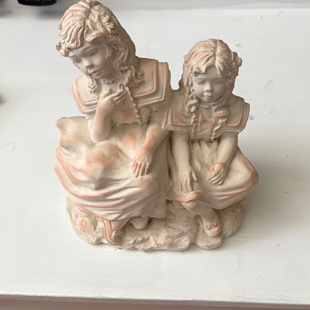 Charming Cream and Tan Sculpture of Two Girls